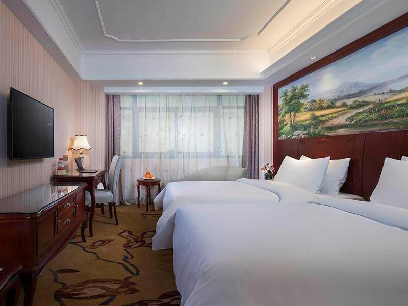 Vienna International Hotel Fenghua Zhongshan Road Exterior foto