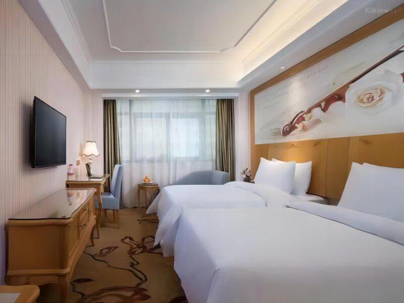 Vienna International Hotel Fenghua Zhongshan Road Exterior foto